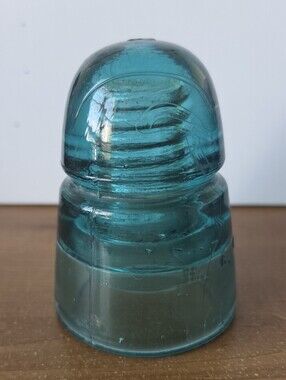 Vintage H G Co. Collectible Teal Glass Insulator Decorative Accent